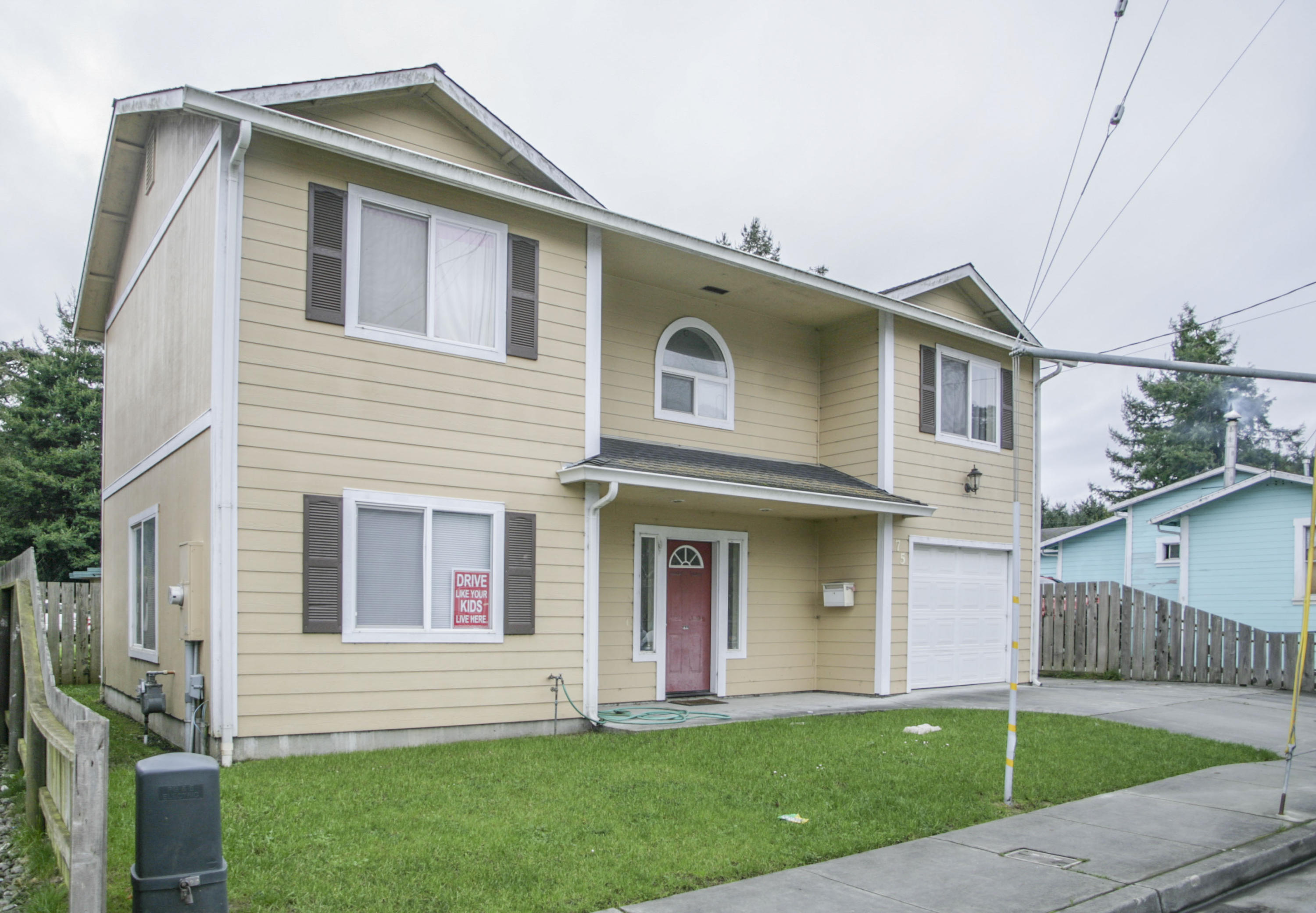 75 Ash Street Rio Dell, CA 95562 - Photo 1 of 1 a front view of a house with a yard
