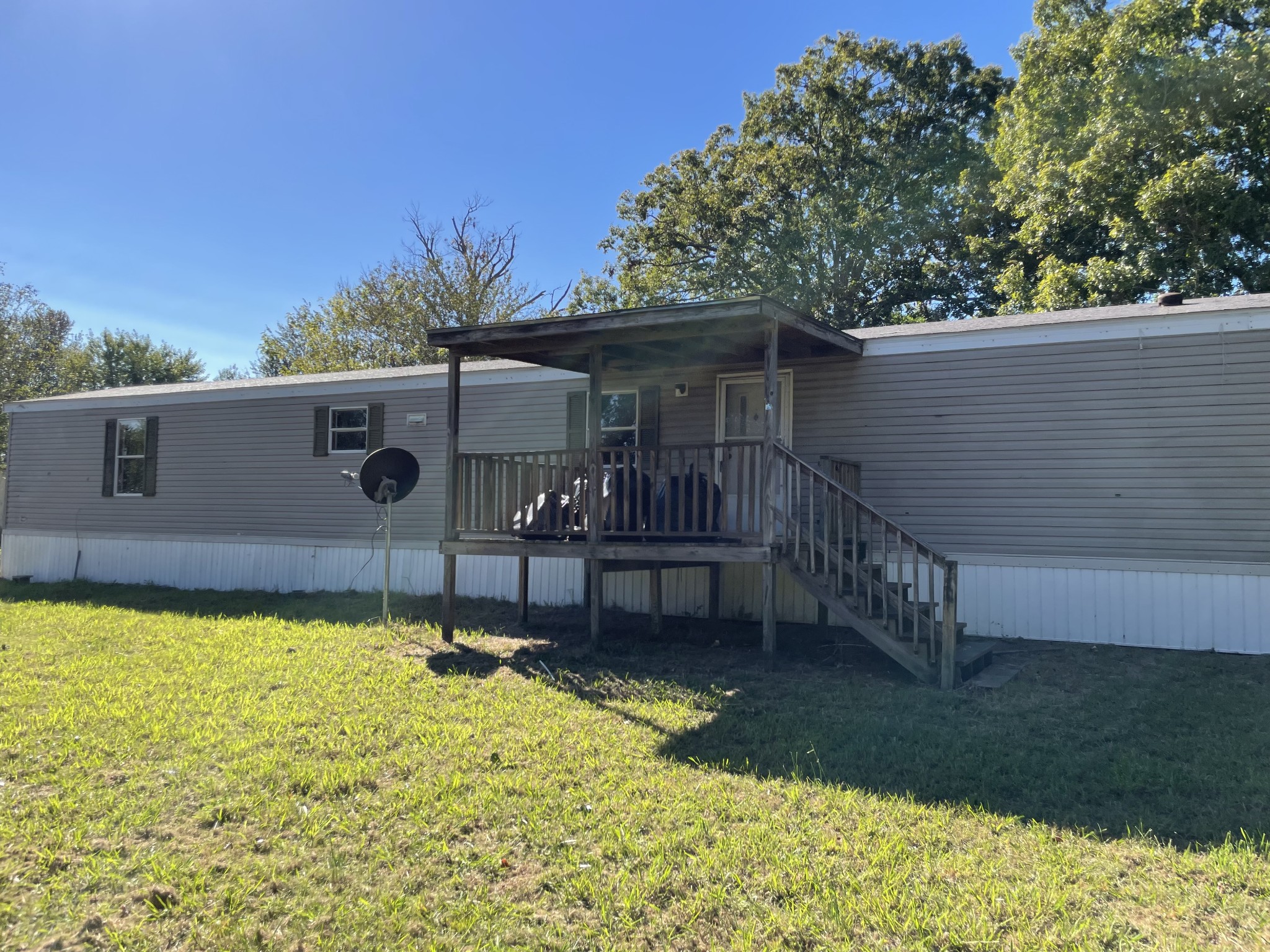 82 Ben Thompson Road Kelso, TN 37348 - Photo 1 of 13 a front view of a house with a yard