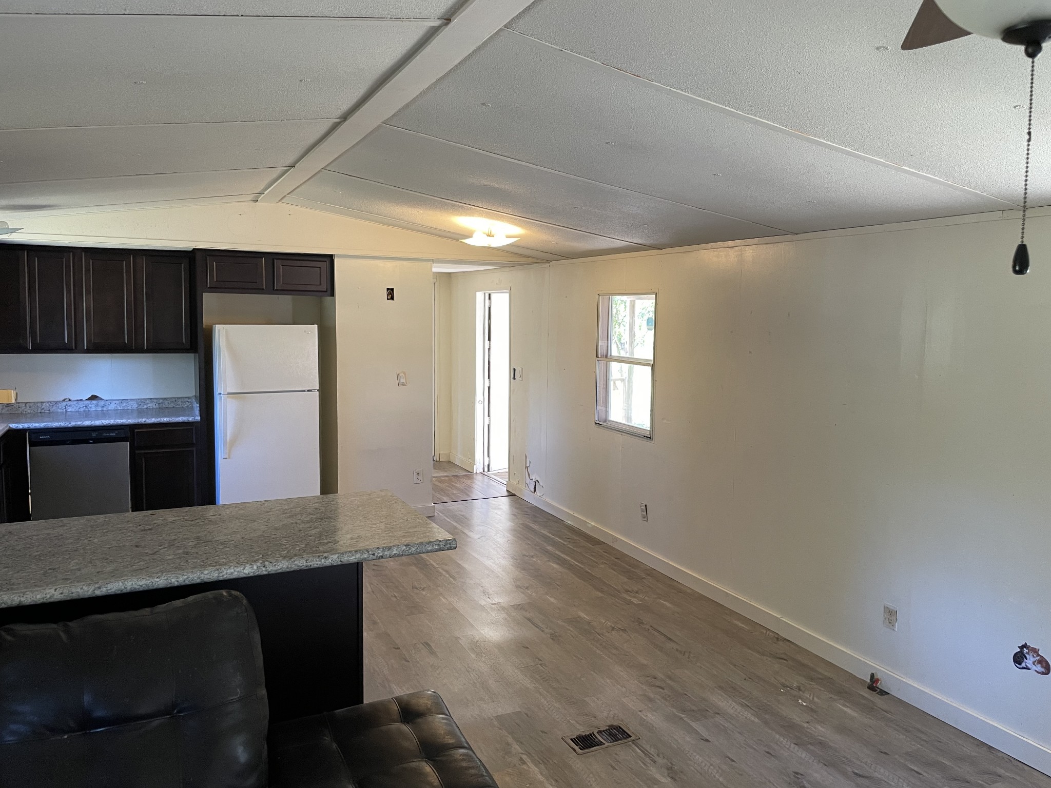 82 Ben Thompson Road Kelso, TN 37348 - Photo 6 of 13 a kitchen with a table and chairs