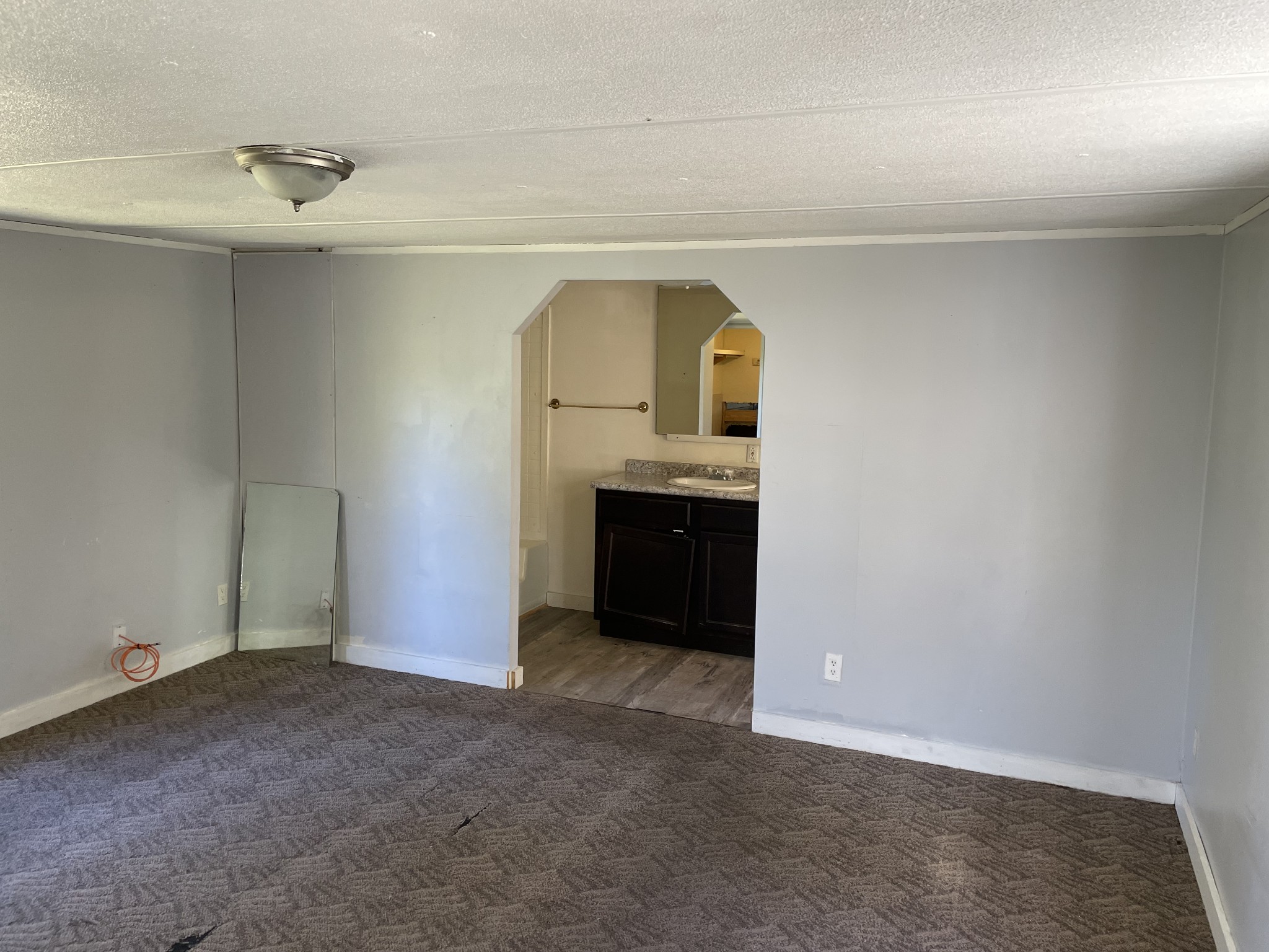 82 Ben Thompson Road Kelso, TN 37348 - Photo 10 of 13 a room with a sink and a mirror