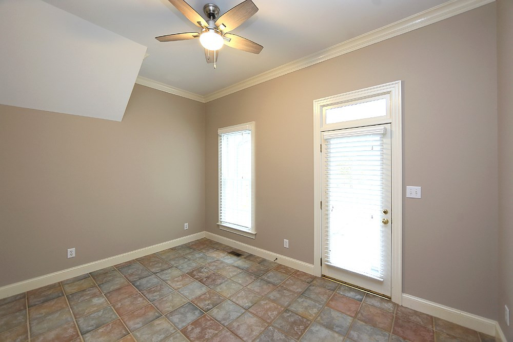 8617 Cold Springs Road Raleigh, NC 27615 - Photo 17 of 30 Door to the wrap-around-porch and close to the kitchen. Craft/Project Room