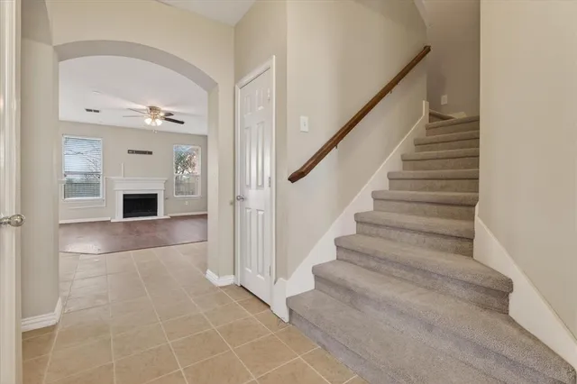 a view of a livingroom with a staircase