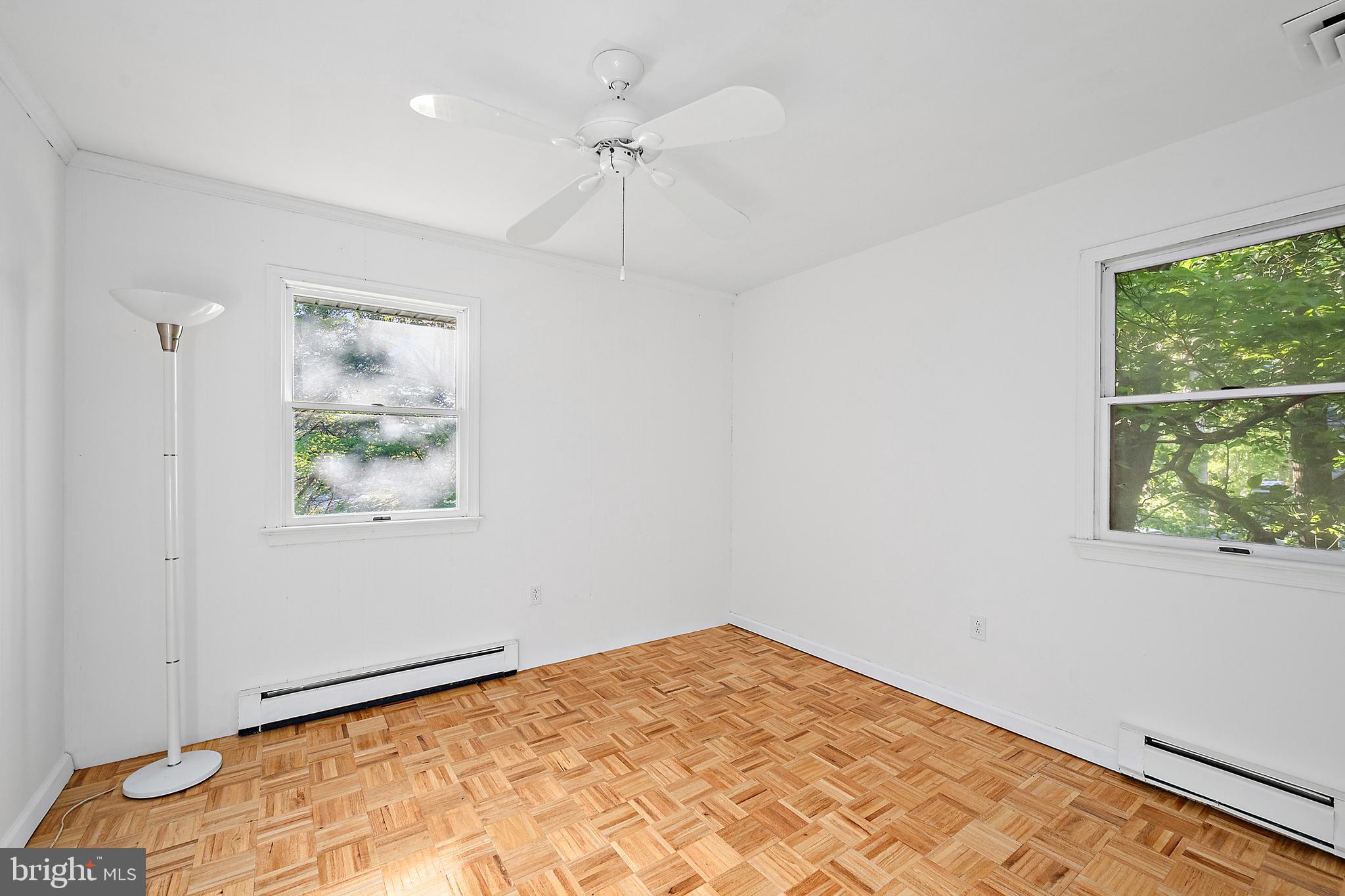6181 Rockawalkin Road Salisbury, MD 21801 - Photo 37 of 65 a view of empty room with window and ceiling fan