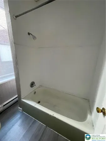 a bathroom with a bathtub