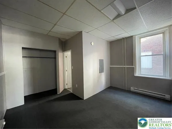 an empty room with windows