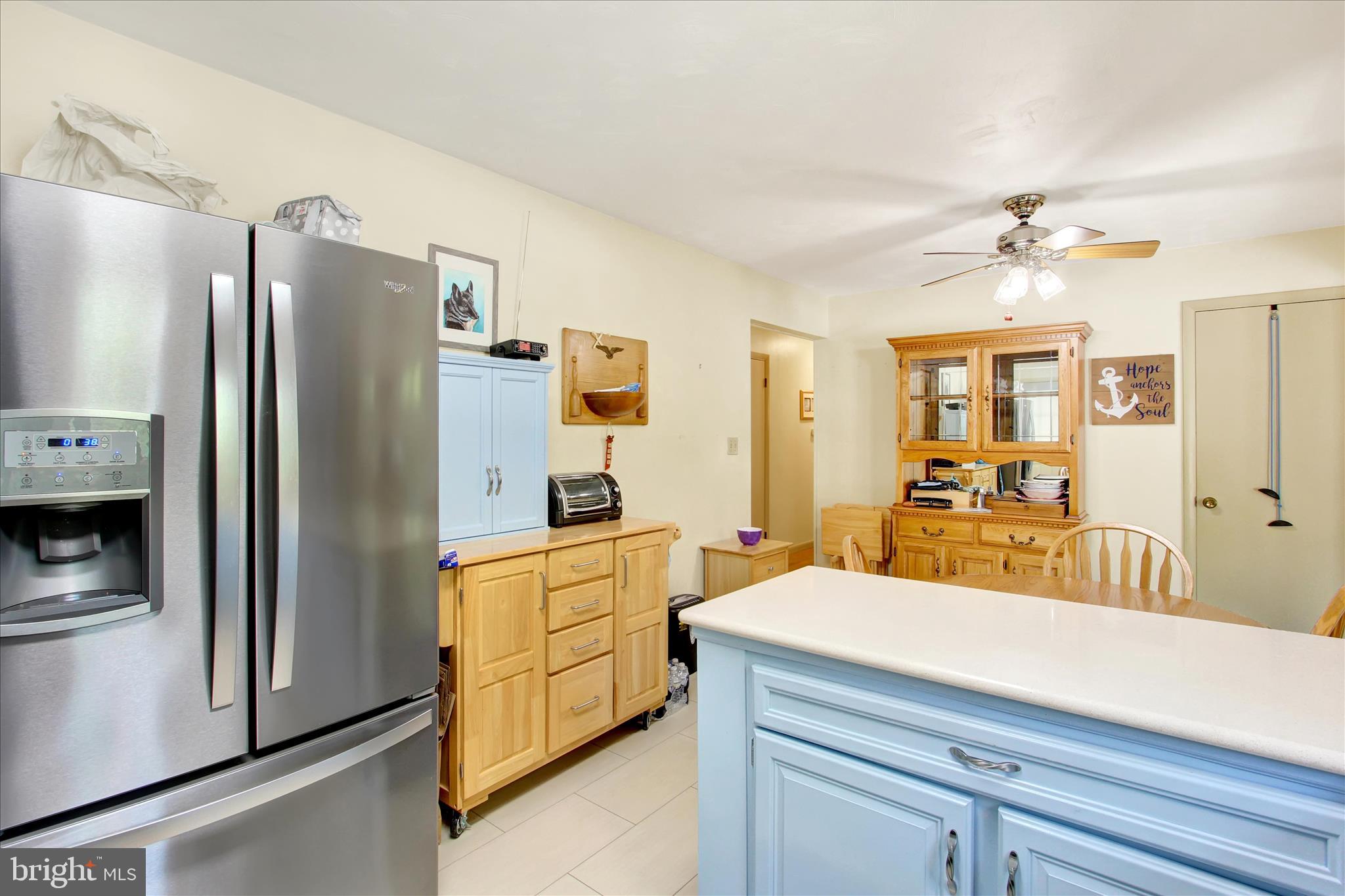 2275 Mummasburg Road Gettysburg, PA 17325 - Photo 21 of 31 a kitchen with stainless steel appliances a refrigerator sink and cabinets