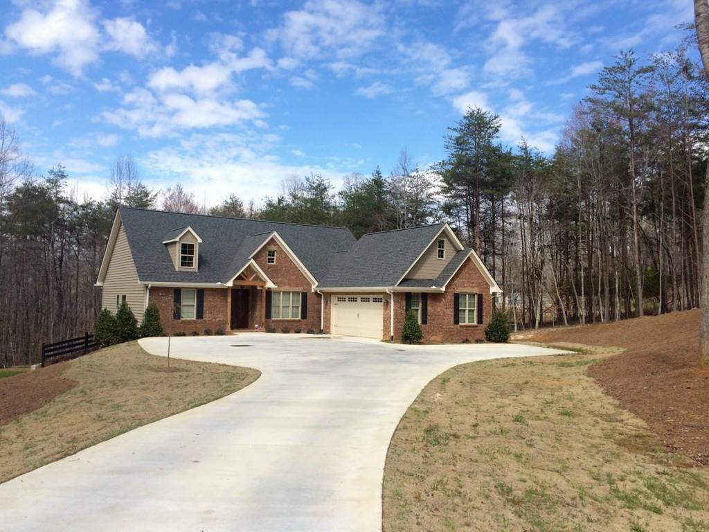 3705 Lakeland Road Gainesville, GA 30506 - Photo 1 of 1 a front view of a house with a yard