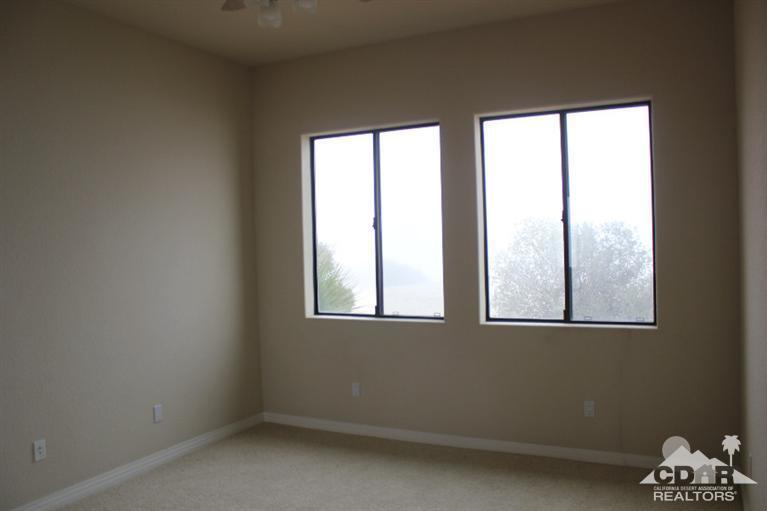 53966 Ridge Road Yucca Valley, CA 92284 - Photo 15 of 20 an empty room with a window