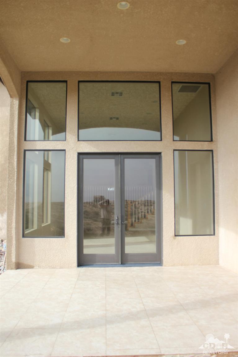 53966 Ridge Road Yucca Valley, CA 92284 - Photo 16 of 20 a view of entrance gate of an empty room