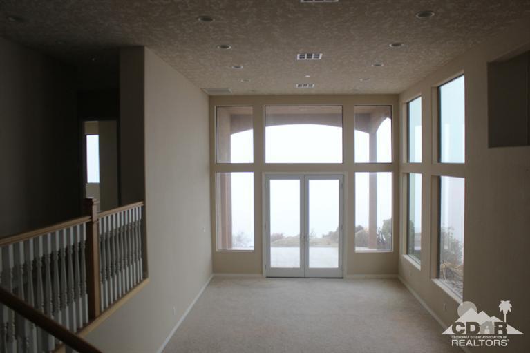 53966 Ridge Road Yucca Valley, CA 92284 - Photo 7 of 20 a view of hallway with windows