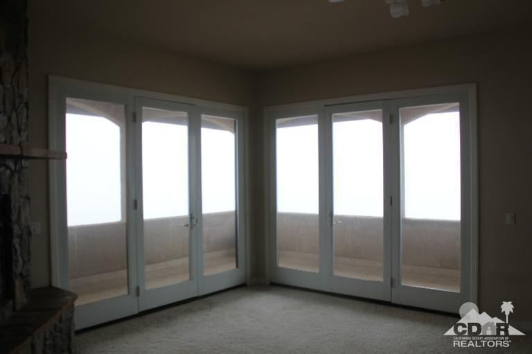 53966 Ridge Road Yucca Valley, CA 92284 - Photo 8 of 20 a view of an empty room and window
