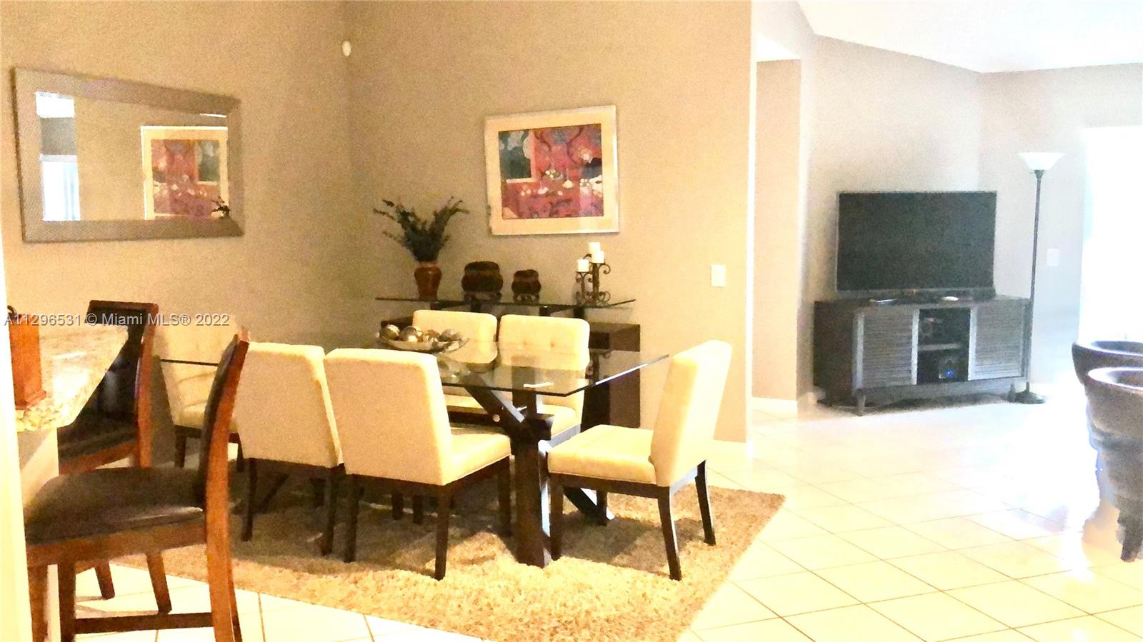 Savanna Weston, FL 33327 - Photo 3 of 7 a view of a dining room with furniture