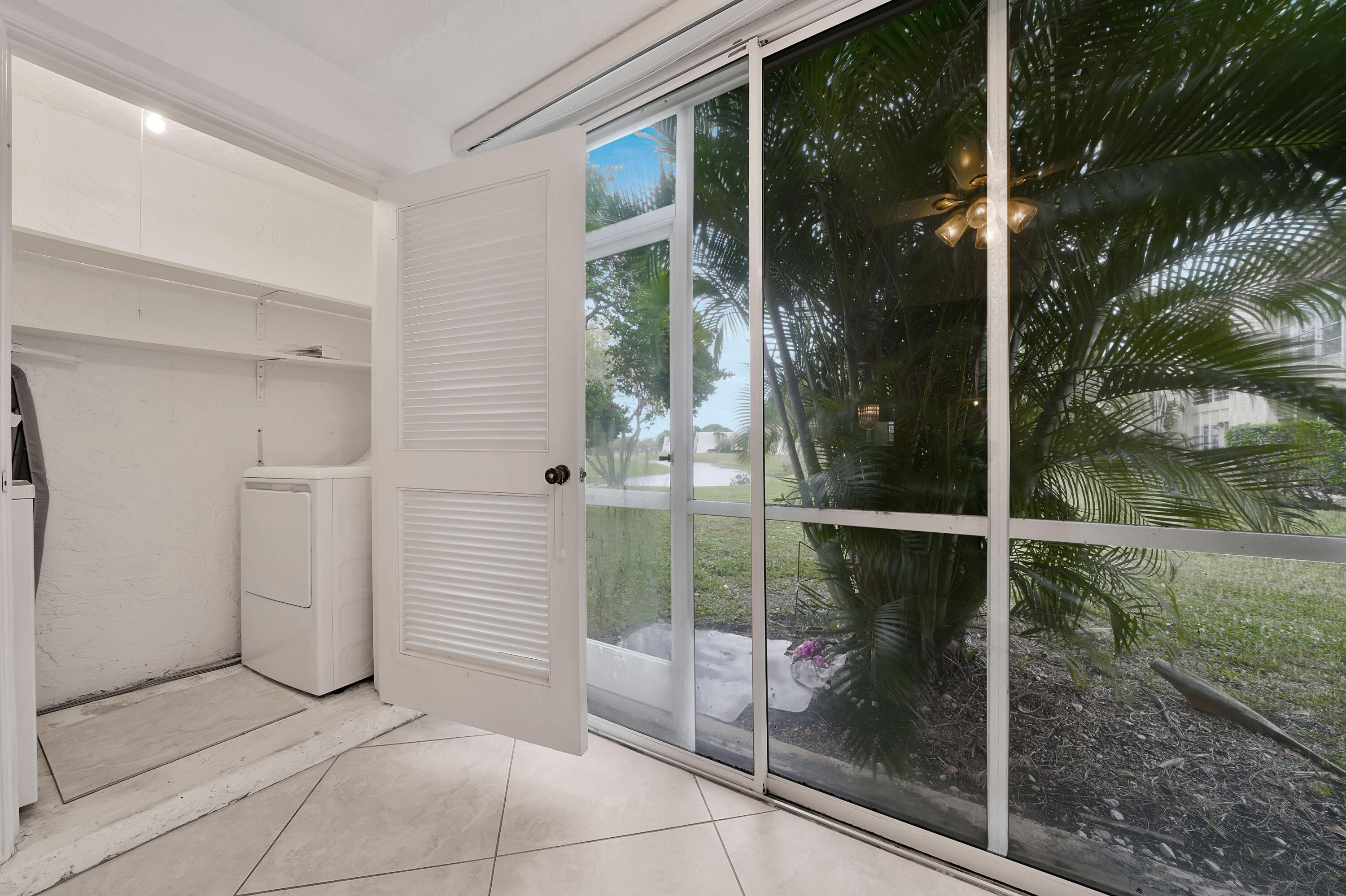 829 Camino Road, Unit 107 Delray Beach, FL 33445 - Photo 40 of 47 Laundry Closet (1)