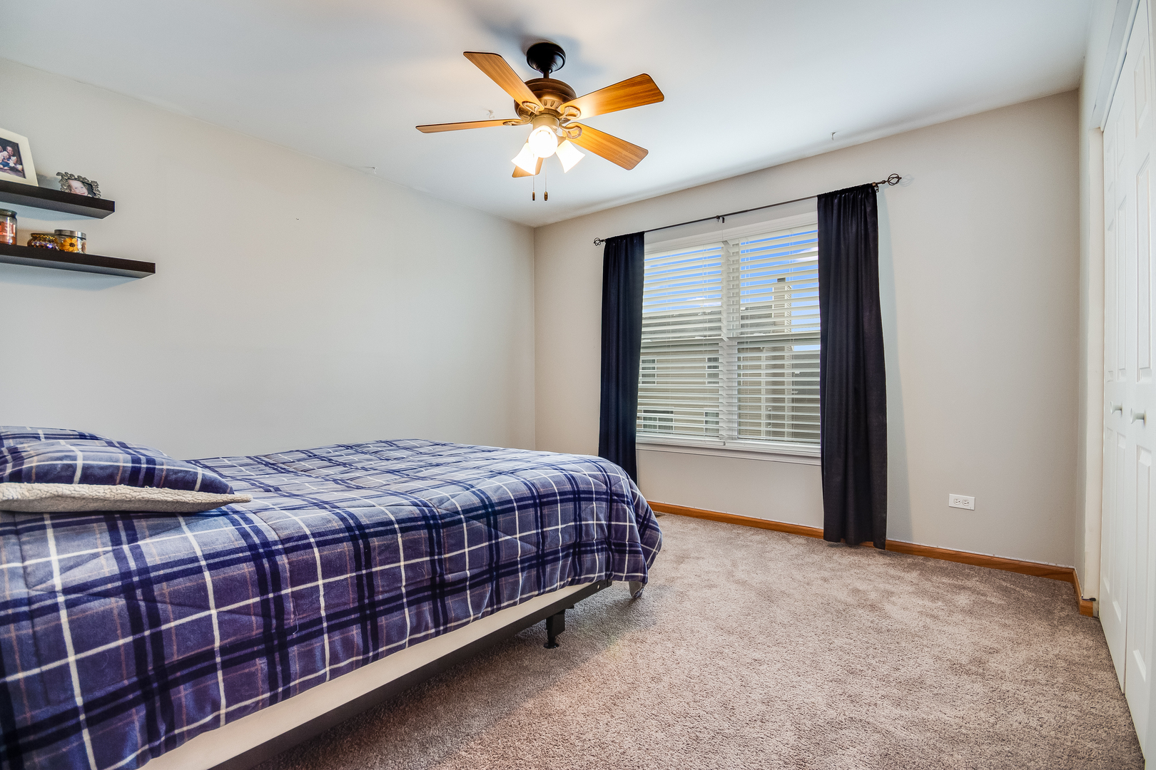 7654 Pin Oak Court Plainfield, IL 60586 - Photo 18 of 41 a bedroom with a bed and window