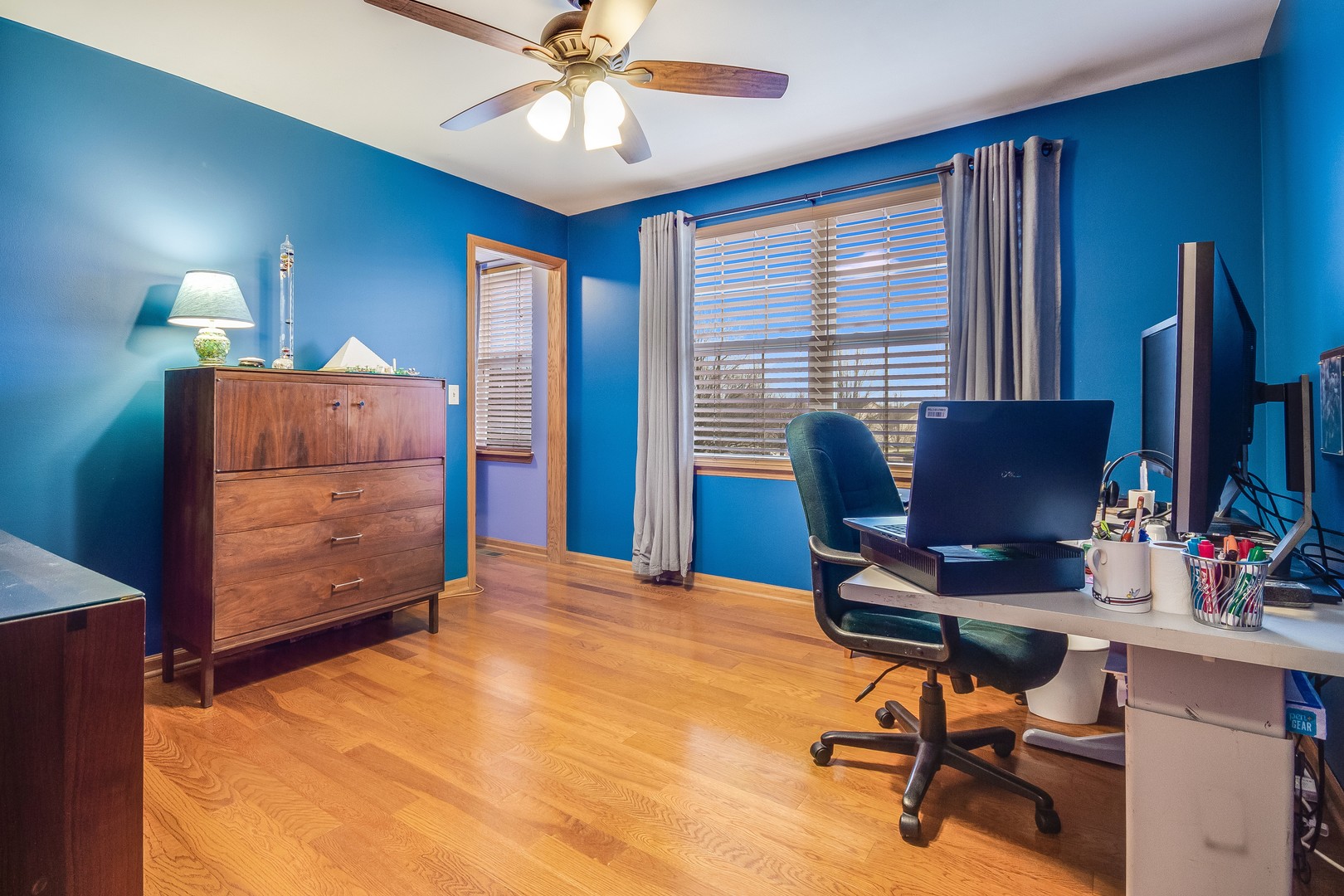 7654 Pin Oak Court Plainfield, IL 60586 - Photo 20 of 41 a workspace with furniture and a window