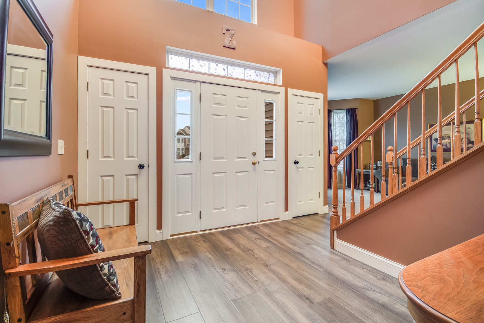 7654 Pin Oak Court Plainfield, IL 60586 - Photo 2 of 41 a view of an entryway with wooden floor