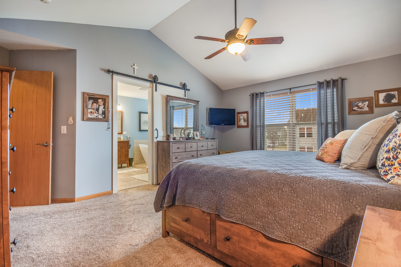 7654 Pin Oak Court Plainfield, IL 60586 - Photo 23 of 41 a bed room with a bed and a ceiling fan