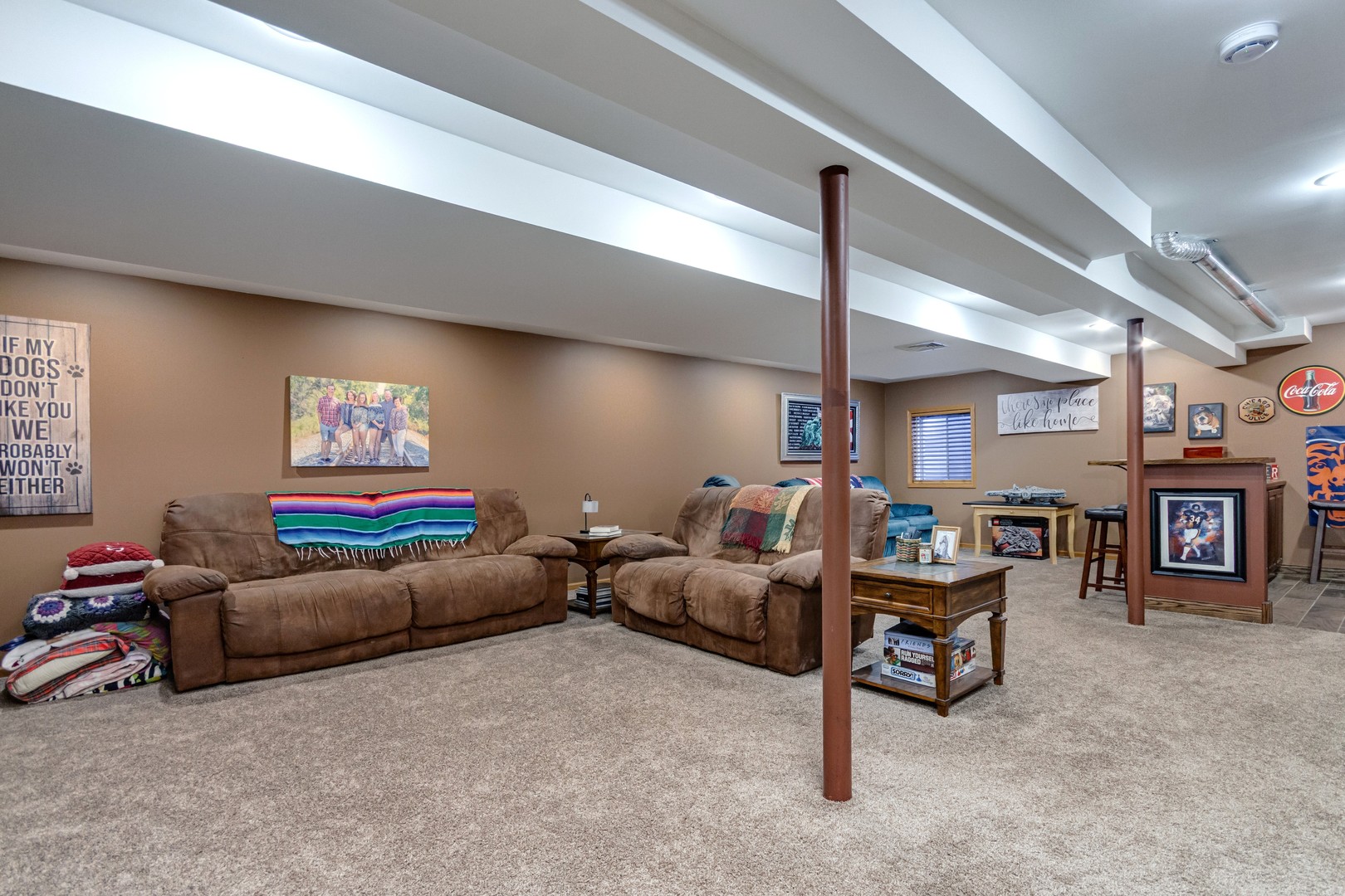 7654 Pin Oak Court Plainfield, IL 60586 - Photo 30 of 41 a living room with furniture and a fireplace