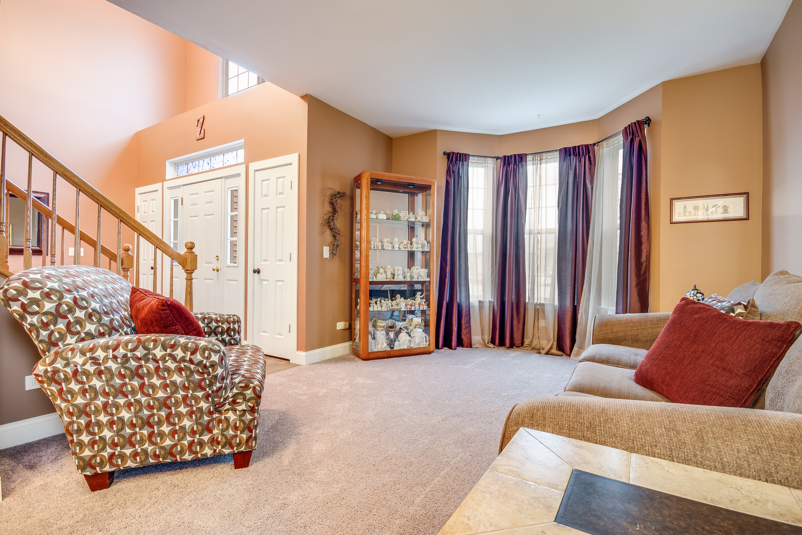 7654 Pin Oak Court Plainfield, IL 60586 - Photo 3 of 41 a living room with furniture and a window