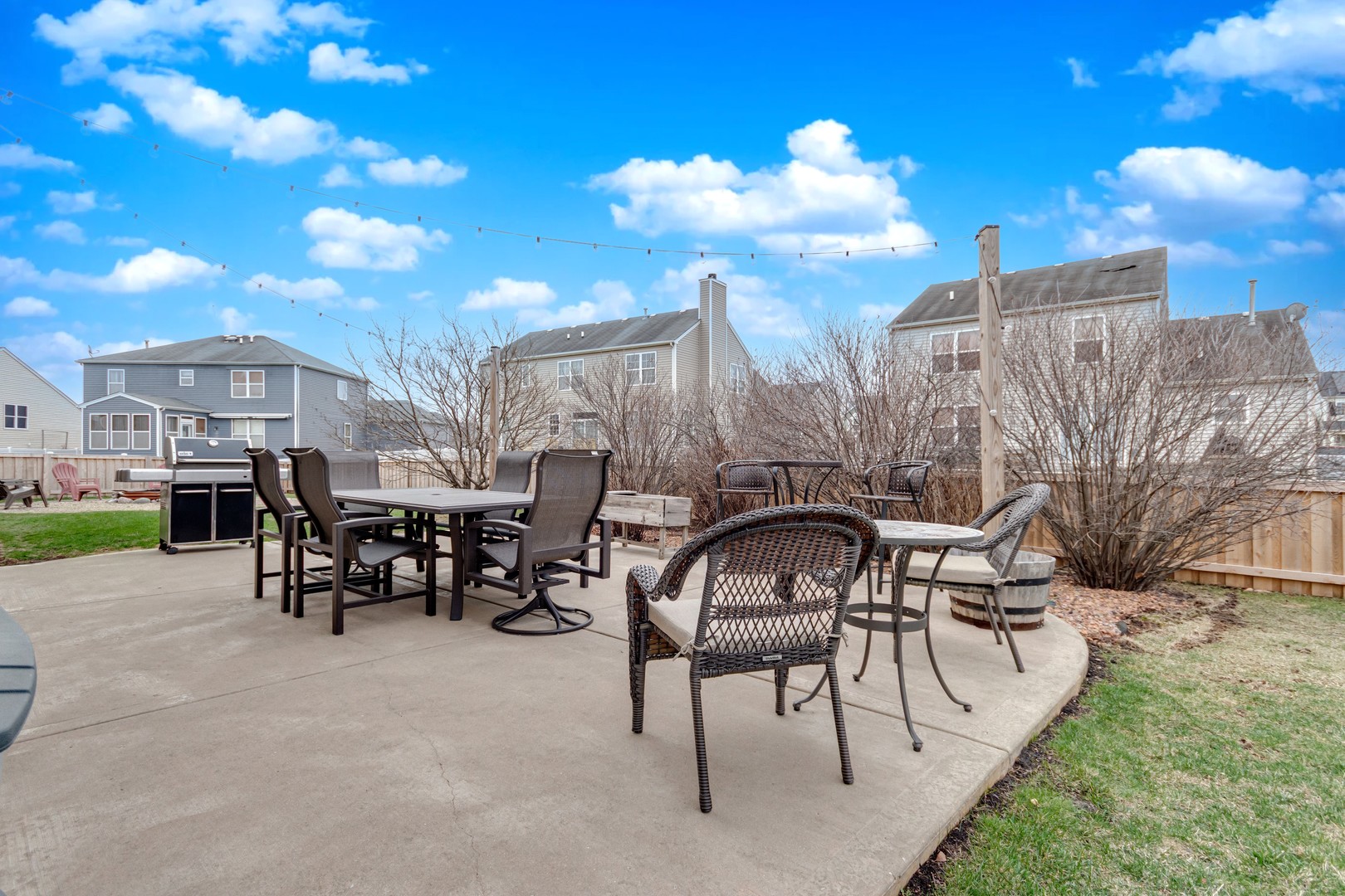 7654 Pin Oak Court Plainfield, IL 60586 - Photo 34 of 41 a view of a chairs and tables in the patio