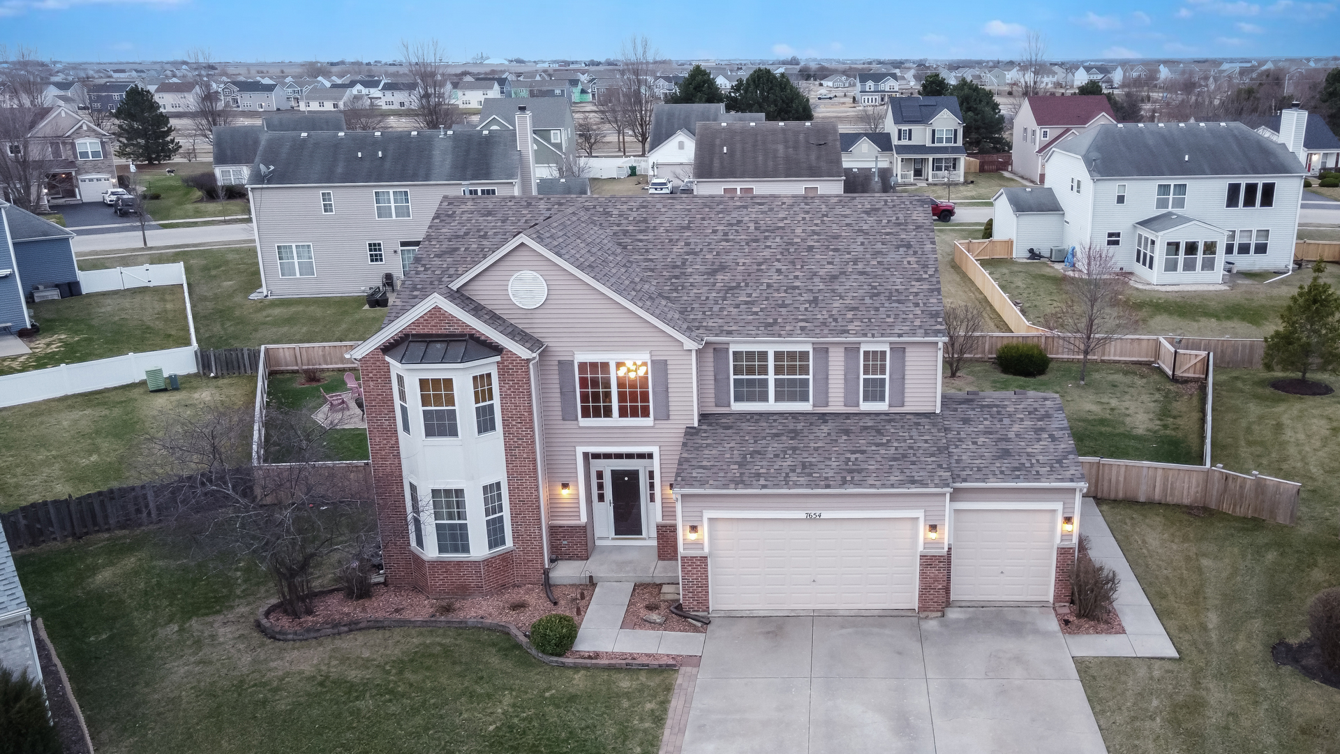 7654 Pin Oak Court Plainfield, IL 60586 - Photo 37 of 41 an aerial view of a house with a yard
