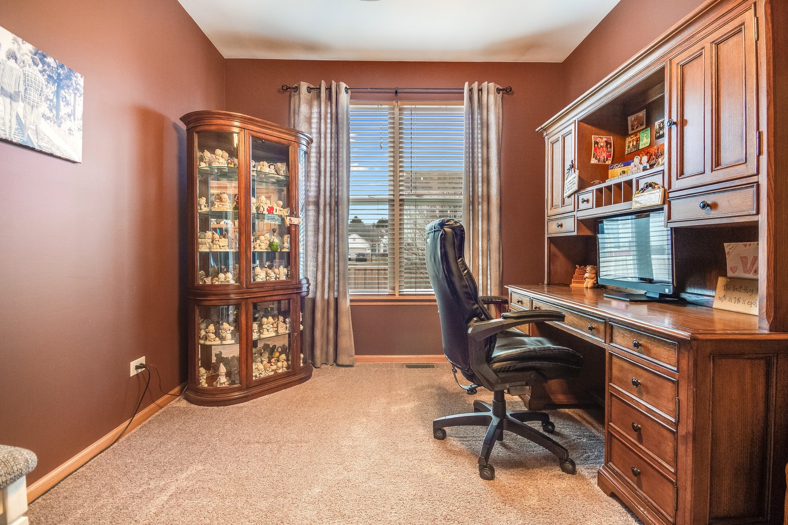 7654 Pin Oak Court Plainfield, IL 60586 - Photo 6 of 41 a view of a workspace with furniture and a window
