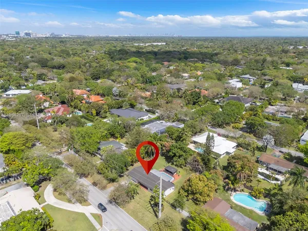 a view of city and green space