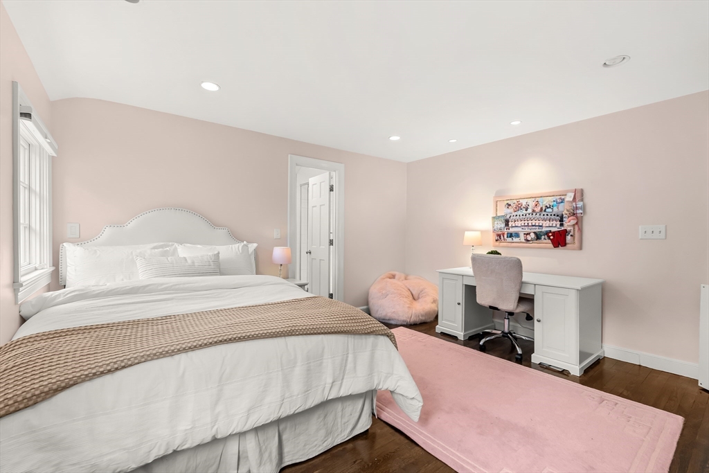 27 Radcliffe Road Wellesley, MA 02482 - Photo 25 of 38 a bedroom with a bed and a dresser