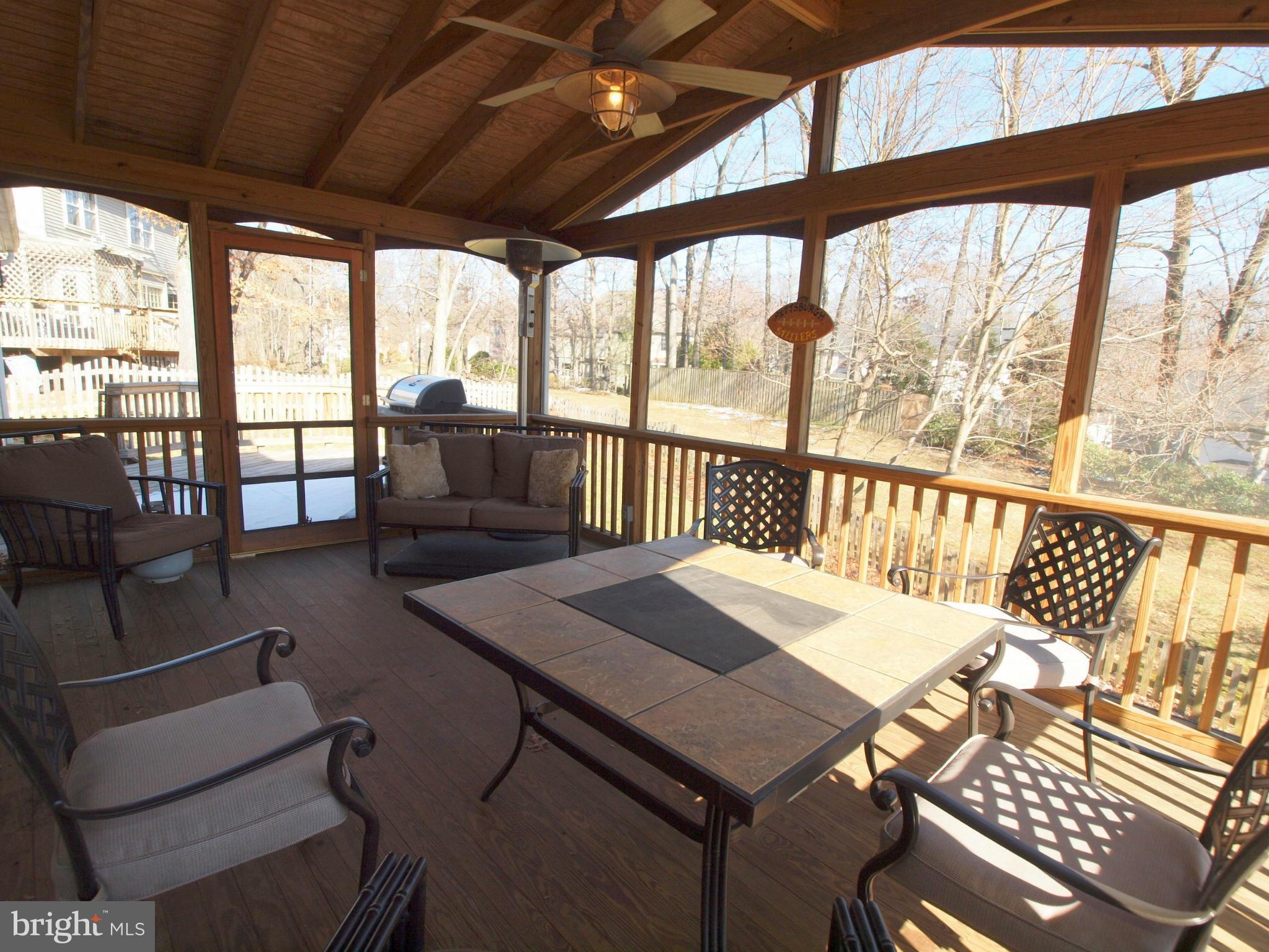 6823 Spring Beauty Court Springfield, VA 22152 - Photo 25 of 29 a view of a dining room with furniture window and outside view