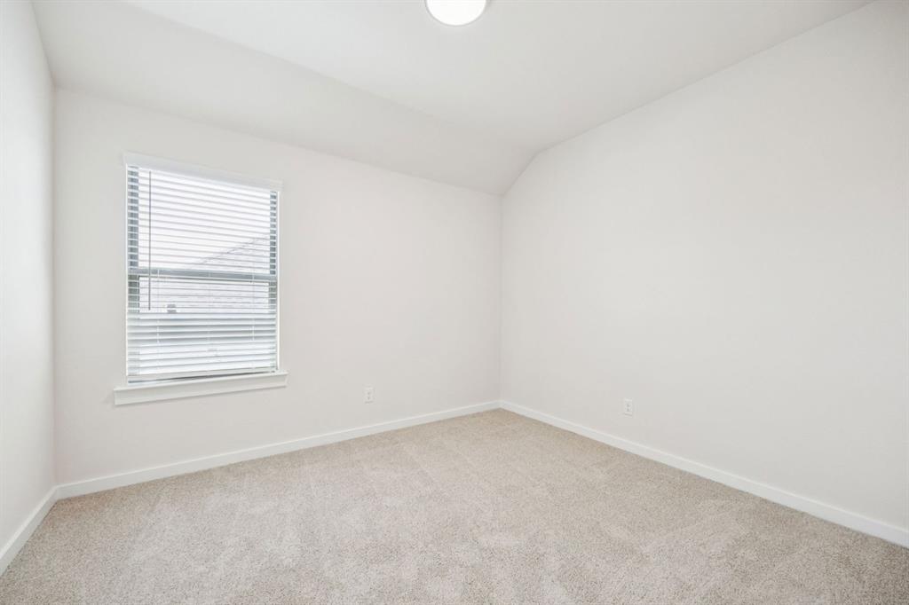 1127 Sunward Road Princeton, TX 75407 - Photo 26 of 29 an empty room with a window