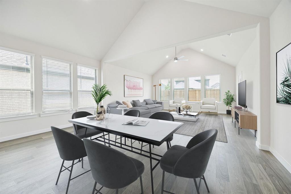 1127 Sunward Road Princeton, TX 75407 - Photo 8 of 29 a view of a a dining room with furniture window and wooden floor