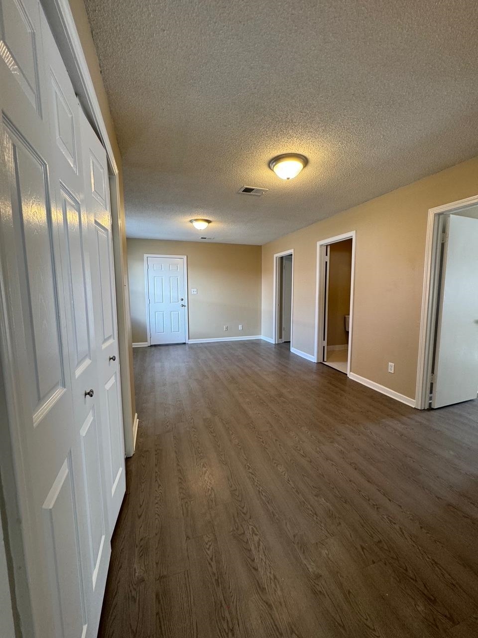 243 West Brooks Road Memphis, TN 38109 - Photo 9 of 19 a view of a hallway with wooden floor