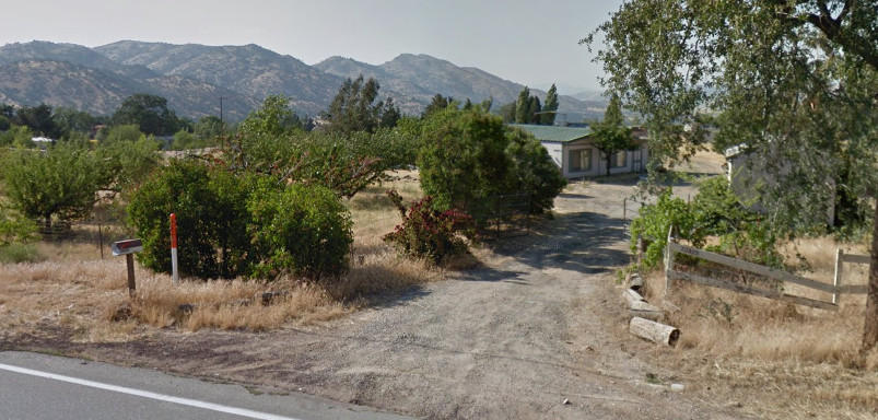 20825 Highline Road Tehachapi, CA 93561 - Photo 1 of 19 a view of a dry yard with trees