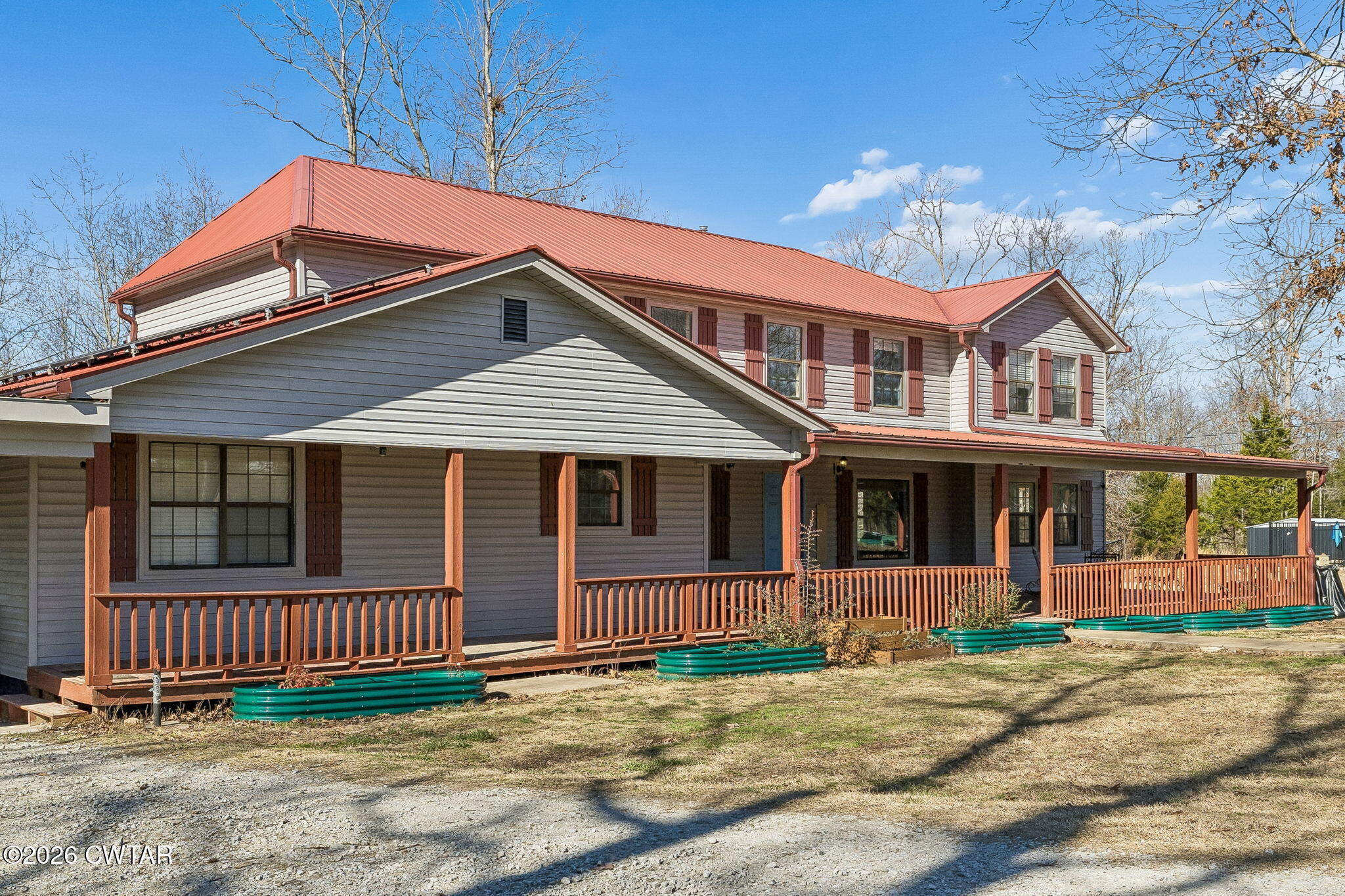 485 Lower Roans Creek Road Linden, TN 37096 - Photo 2 of 54 front view of a house