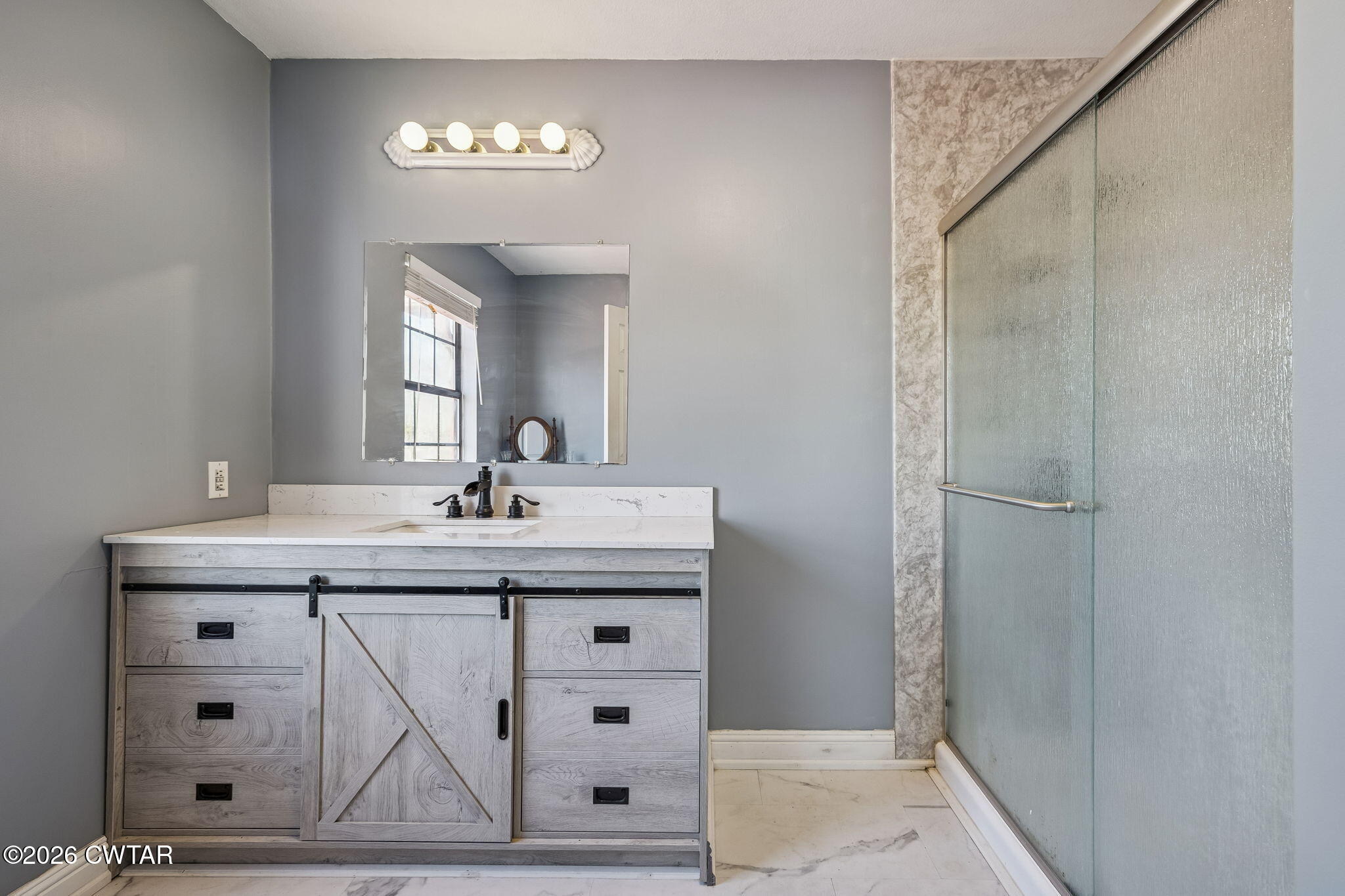 485 Lower Roans Creek Road Linden, TN 37096 - Photo 34 of 54 a bathroom with a granite countertop sink a light fixture and a vanity