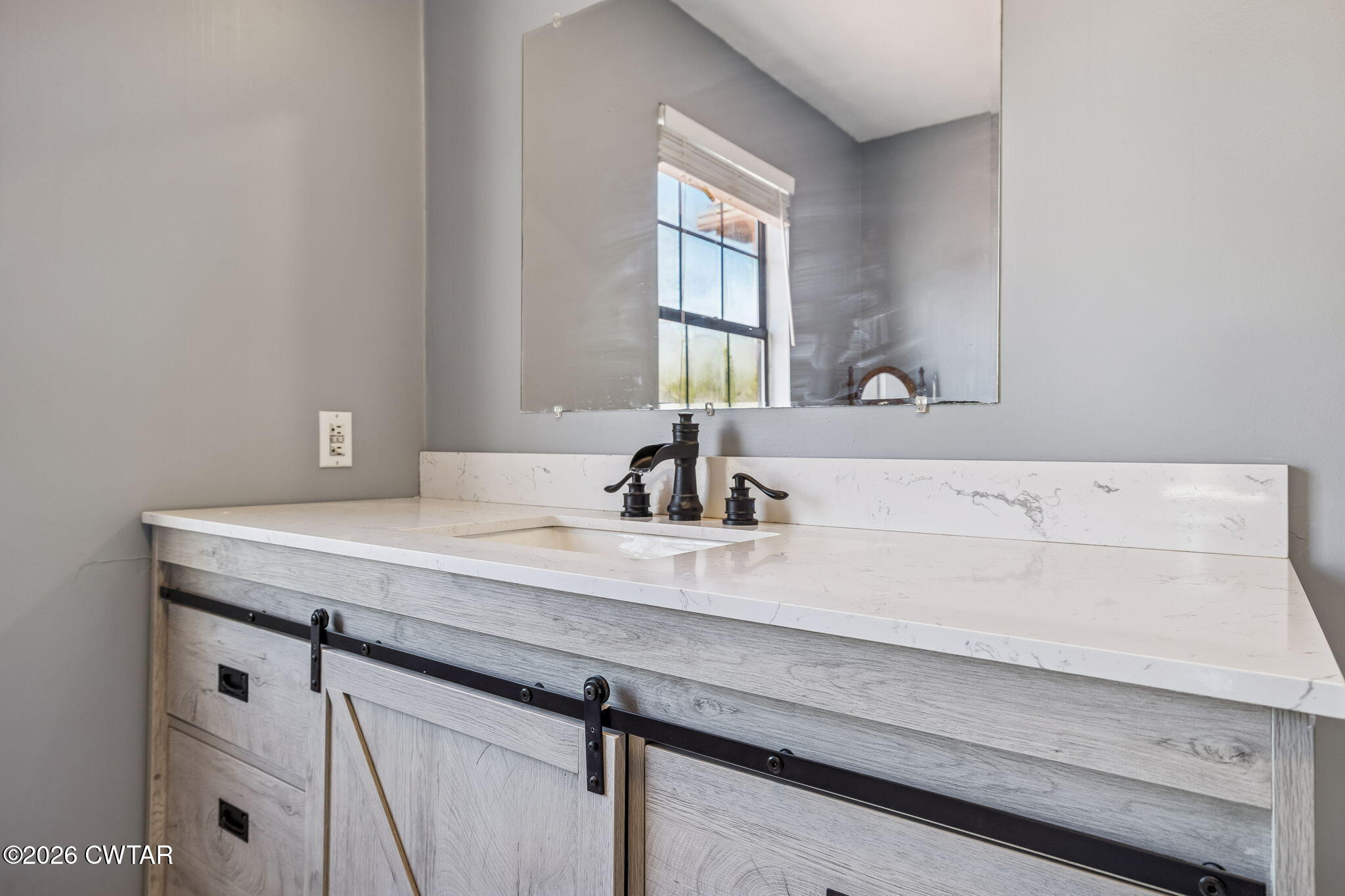 485 Lower Roans Creek Road Linden, TN 37096 - Photo 35 of 54 a bathroom with a sink and a mirror