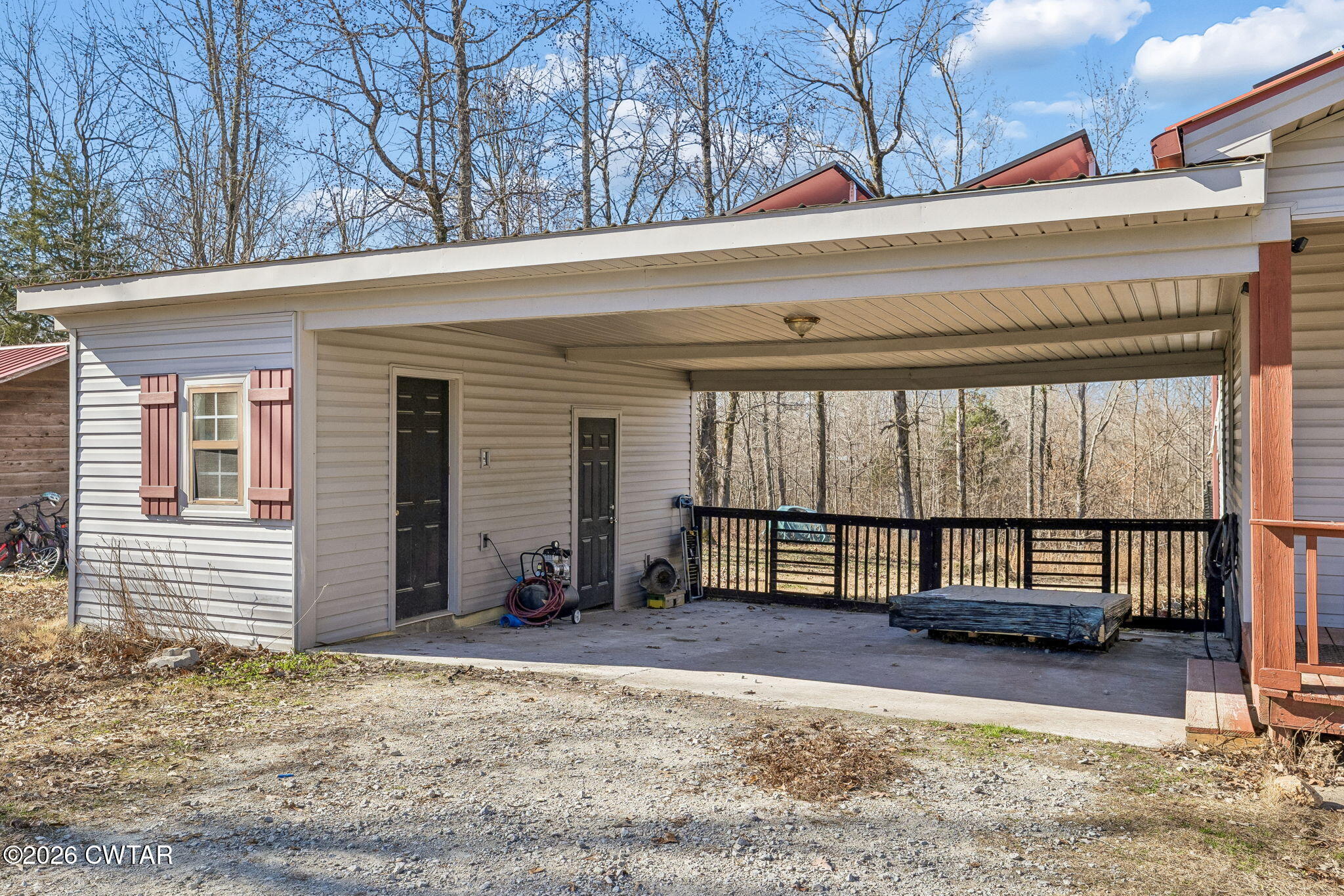 485 Lower Roans Creek Road Linden, TN 37096 - Photo 42 of 54 a view of a house with a wooden floor and a roof top