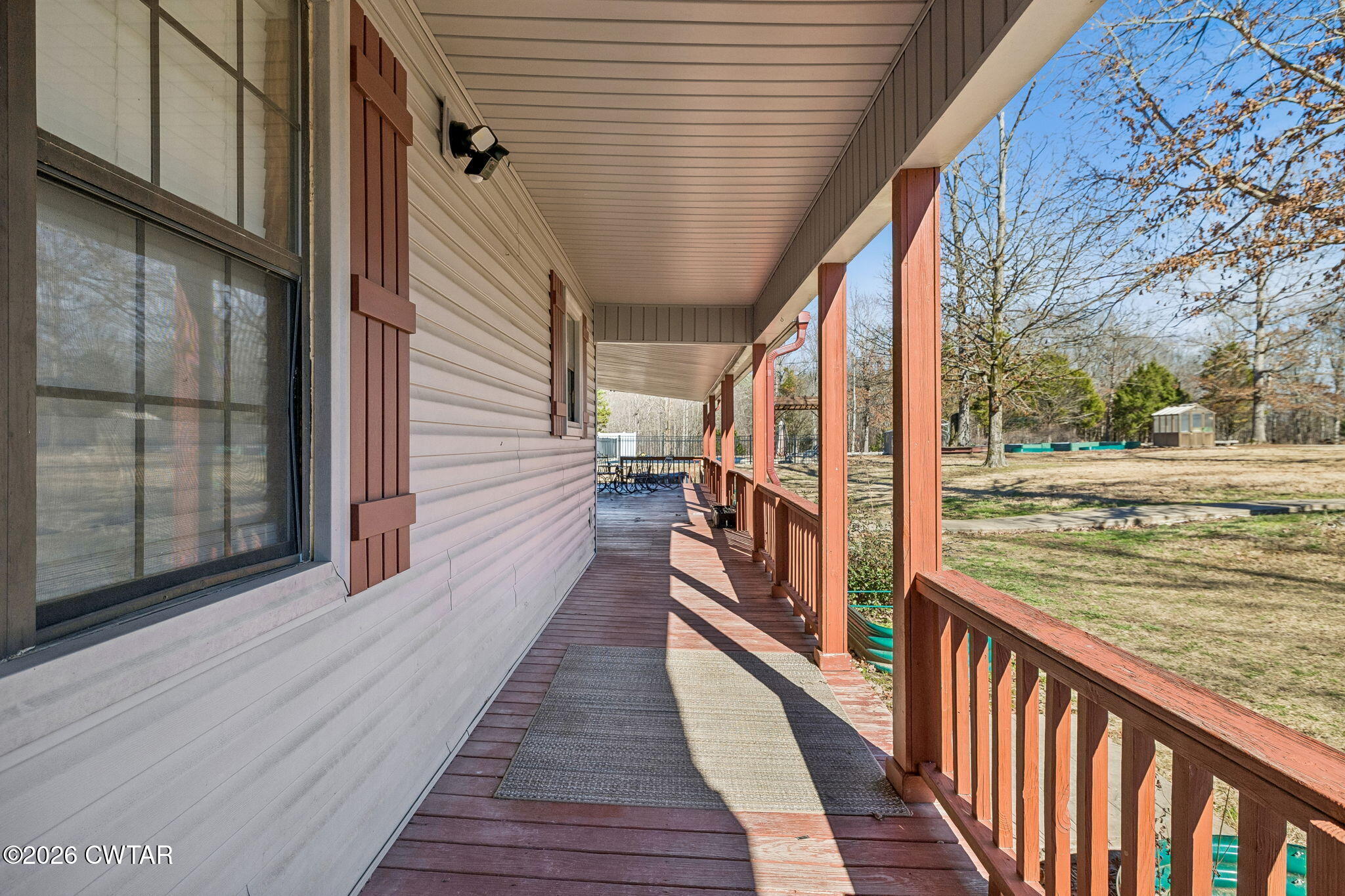 485 Lower Roans Creek Road Linden, TN 37096 - Photo 46 of 54 a view of a balcony with wooden floor