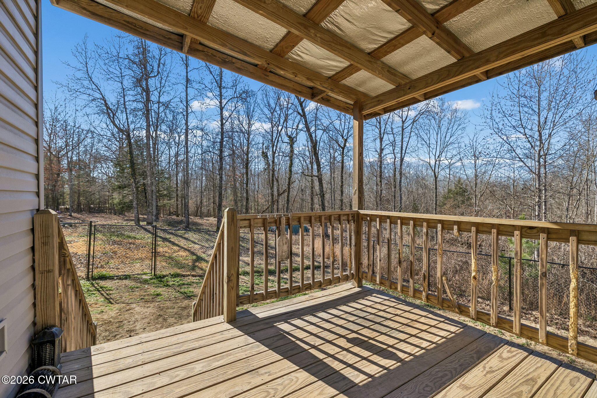 485 Lower Roans Creek Road Linden, TN 37096 - Photo 47 of 54 a view of a balcony with wooden floor