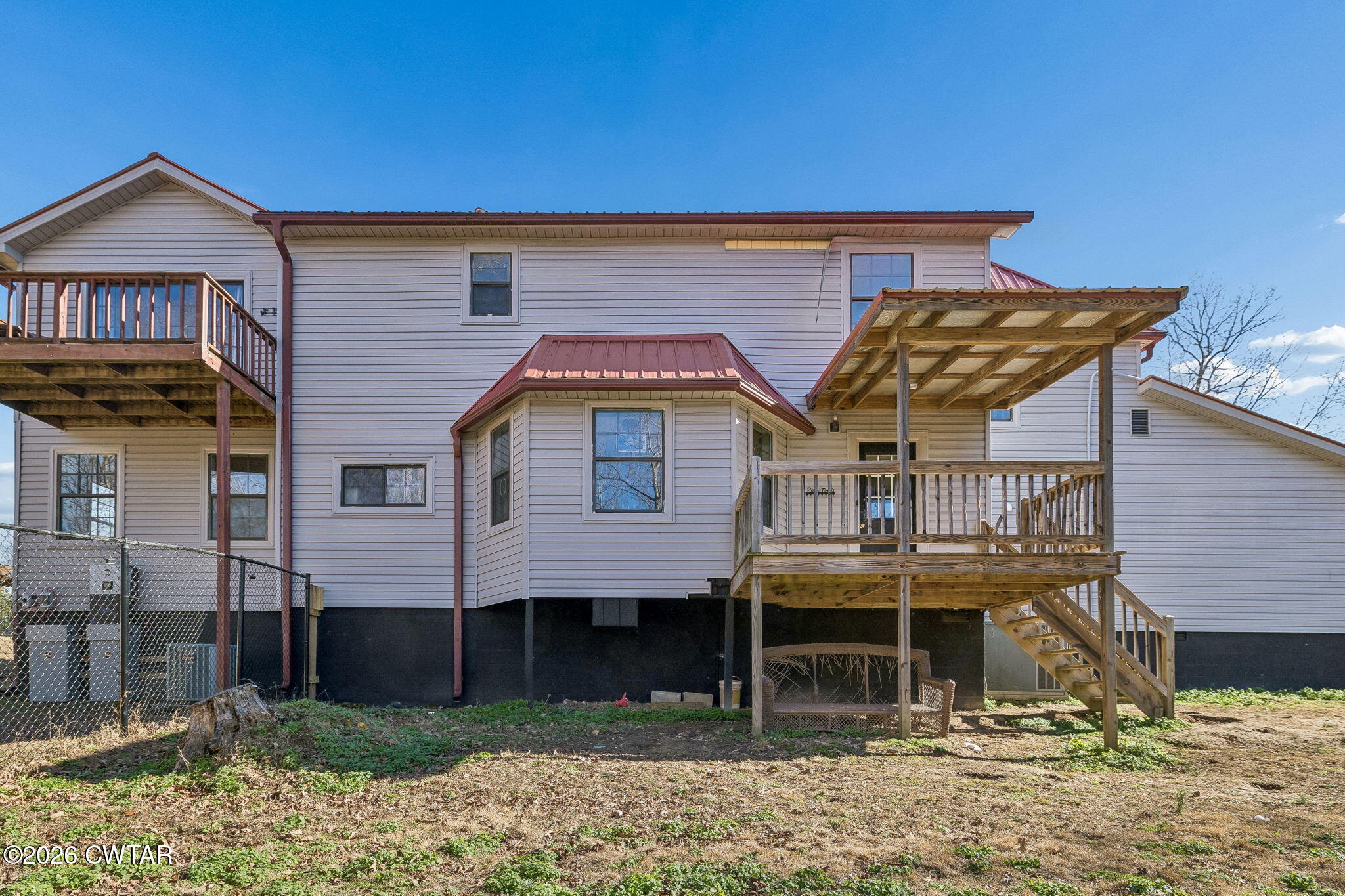 485 Lower Roans Creek Road Linden, TN 37096 - Photo 52 of 54 a front view of a house with garden
