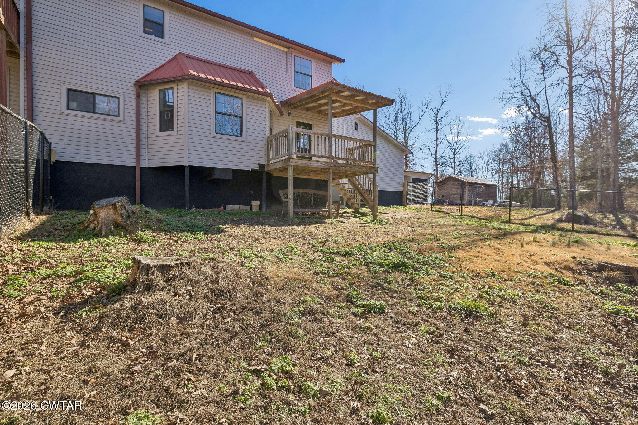 485 Lower Roans Creek Road Linden, TN 37096 - Photo 53 of 54 a front view of a house with a yard