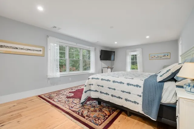 a living room with furniture and a rug