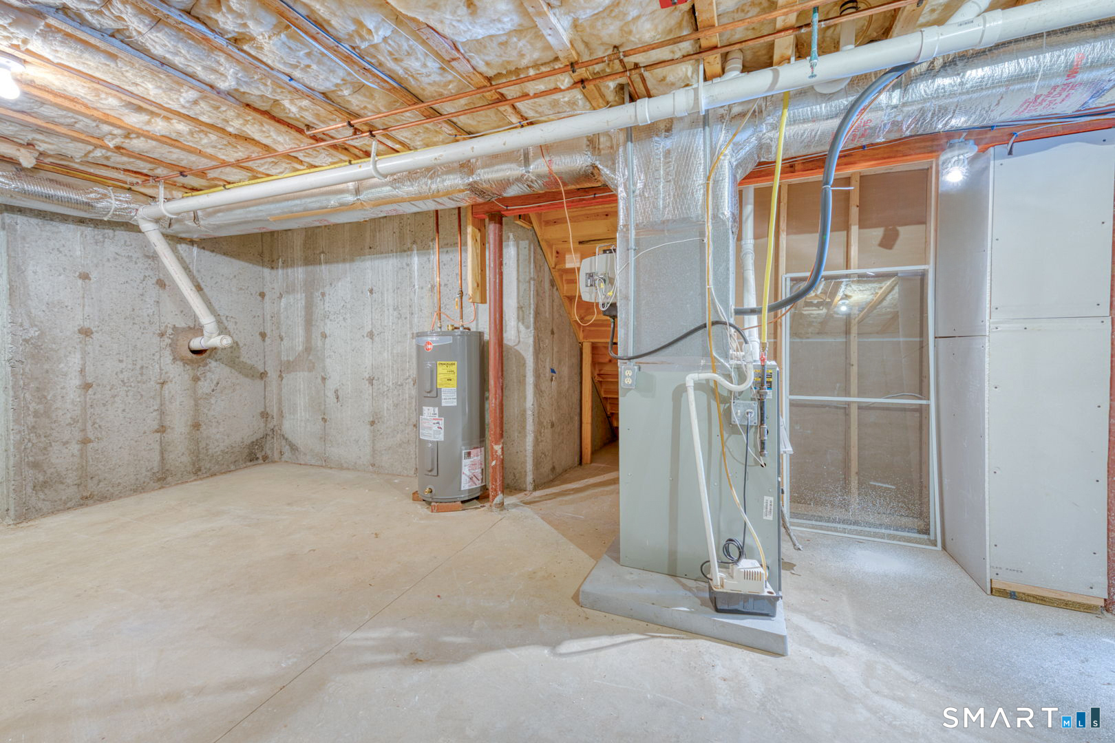 159 Jennifer Lane, Unit 159 Newtown, CT 06482 - Photo 27 of 28 a view of a room with wooden floor