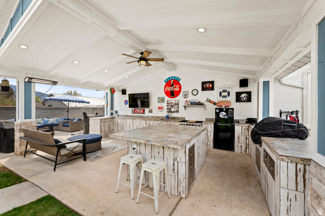 141 North 600 East Mapleton, UT 84664 - Photo 5 of 44 Outside kitchen complete with TV, refrigerator, seating, grilling, etc. Great for hosting game nights.