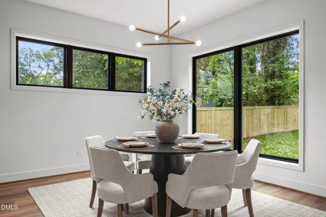 a bathroom with double sink and a mirror