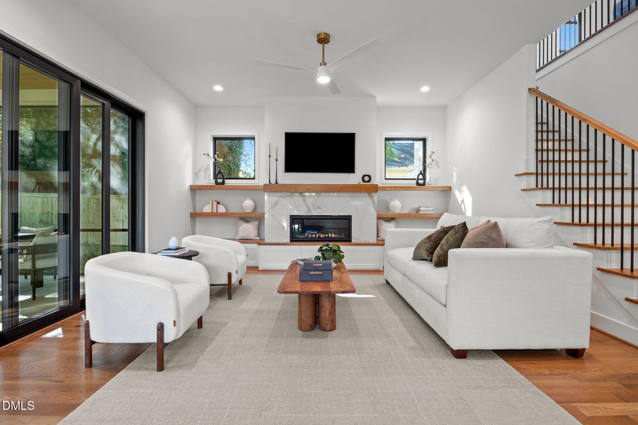 406 Columbia Drive Raleigh, NC 27604 - Photo 18 of 47 a living room with furniture and a flat screen tv