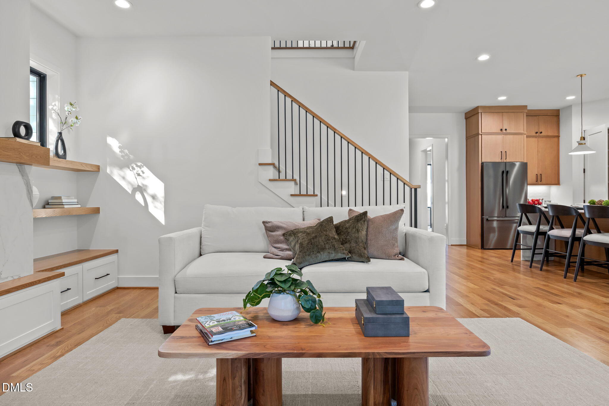 406 Columbia Drive Raleigh, NC 27604 - Photo 20 of 47 a living room with furniture and wooden floor