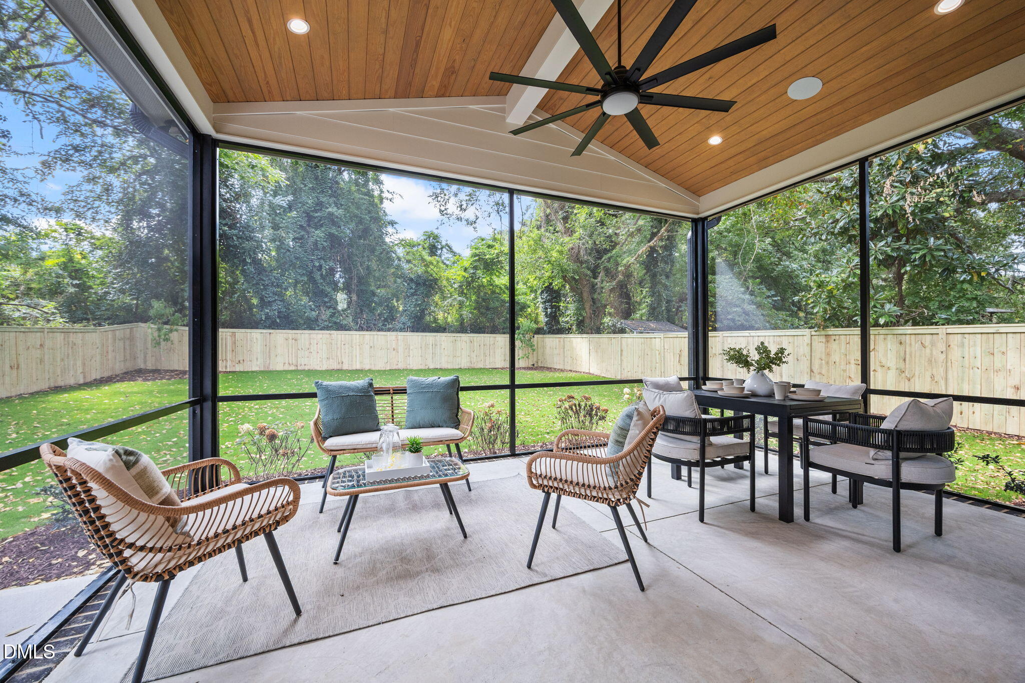 406 Columbia Drive Raleigh, NC 27604 - Photo 25 of 47 a view of chairs and table in patio with a yard
