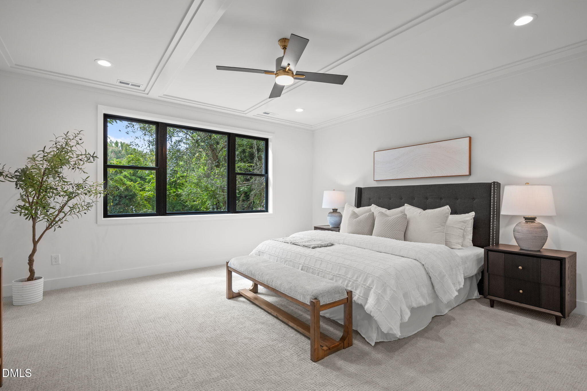 406 Columbia Drive Raleigh, NC 27604 - Photo 33 of 47 a spacious bedroom with a bed and a large window