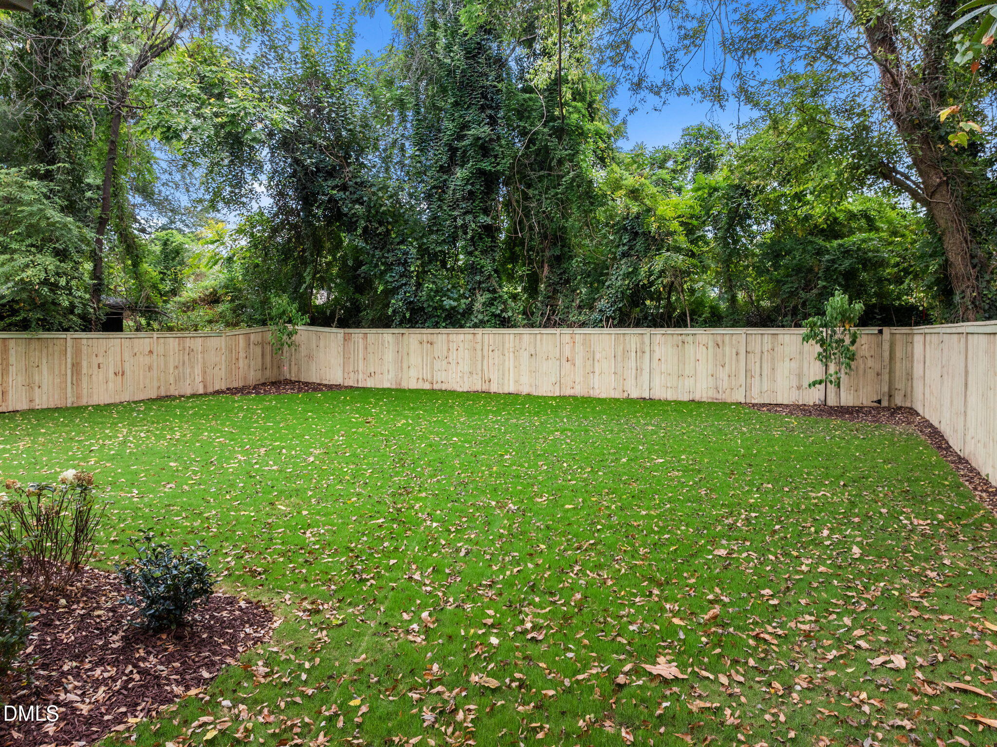 406 Columbia Drive Raleigh, NC 27604 - Photo 4 of 47 a view of a backyard